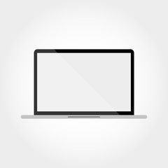 Laptop on a gray background with shadow