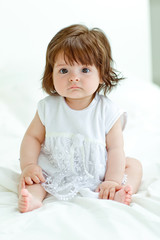 Fototapeta premium Happy baby on the bed 