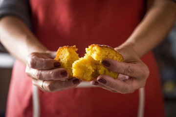 Unrecognizable woman slicing cake