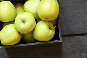 green apples on a black table