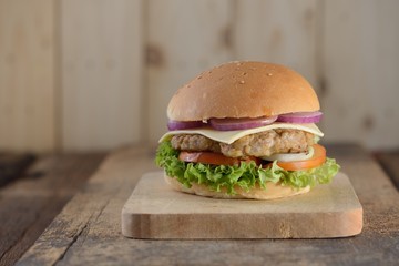 pork burger with wooden background