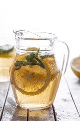 Fresh lemonade in a glass jug