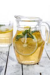 Fresh lemonade in a glass jug