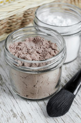 Homemade dry shampoo in a glass jar, close up