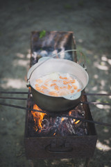 cauldron with fish soup