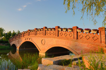 Landscape with brick arch bridg