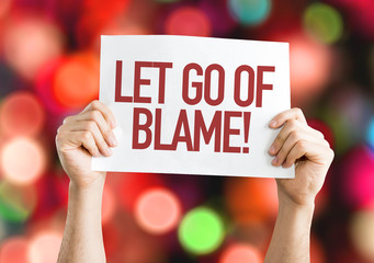 Let Go Of Blame placard with bokeh background