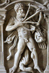 Bas-relief on the ancient sarcophagus in the baths of Diocletian in Rome. Italy