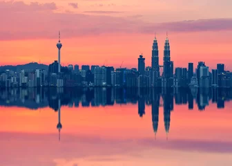 Peel and stick wall murals Kuala Lumpur Scenic view of Kuala Lumpur city skyline in sillhoute with full reflection.
