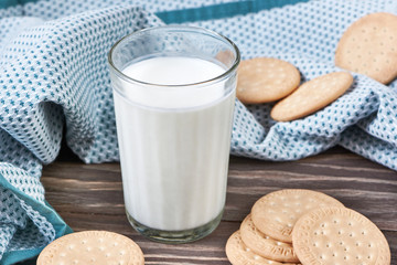 Glass with milk and cookies