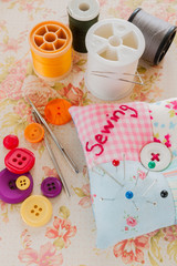 Sewing and needlework buttons thread and pins