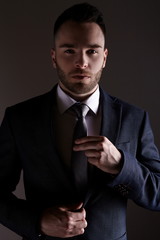 Businessman Fixing his Suit