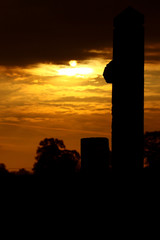 Obraz premium Signpost sunrise / Public footpath signpost at sunrise.