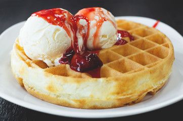 strawberry waffle with vanilla ice cream,selective focus