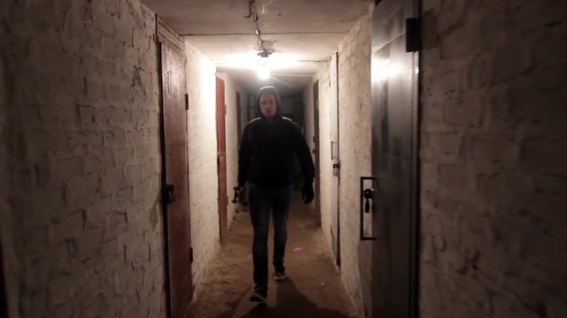 Thief in dark cellar