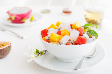 Bowl of fresh exotic fruit salad Healthy breakfast