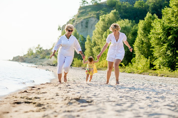 baby, mother and grandmother together