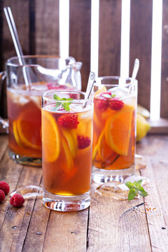 Iced tea with orange and raspberry