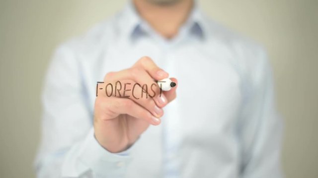 Forecast 2017, man writing on transparent screen