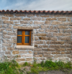 door and window in a rustic wall