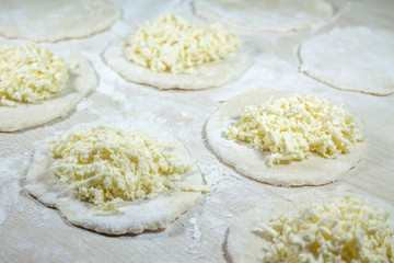 Cooking of fresh homemade delicious dumplings (varenyky) with ch