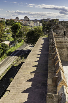 Vertical composition view of Yedikule Fortress wall ruins and tower in Istanbul, Turkey