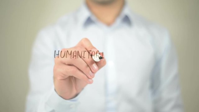Humanitarian Aid  , man writing on transparent screen