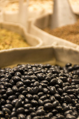 macro detail of legumes baskets in a street market