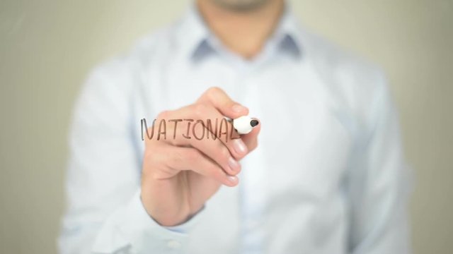 National Debt , man writing on transparent screen