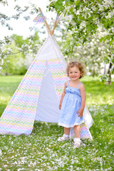 little girl stay near wigwam  © avikki