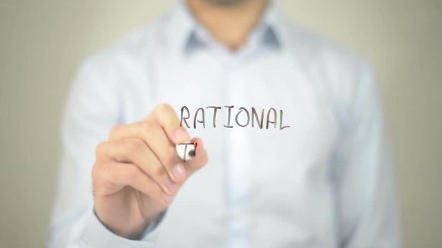 Rational Thinking , man writing on transparent screen