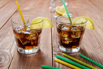 The cooling drink with ice and lemon