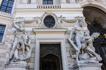 Hercules statue near entrance of Hofburg palace. Vienna, Austria