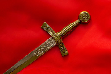 souvenir dagger on a red background