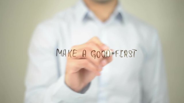 Make A Good First Impression , man writing on transparent screen