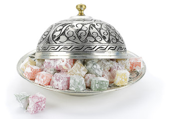 Fototapeta premium Traditional Turkish delight in vintage plate isolated 