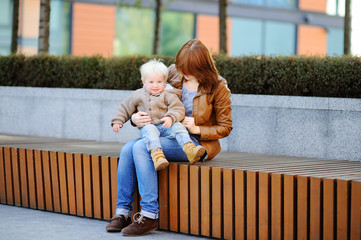 Young woman and her cute toddler son