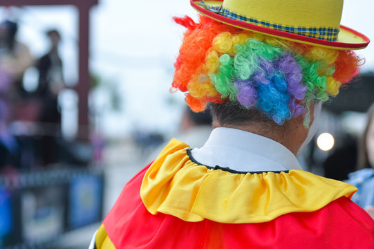 Back View Of Clown On Street Outdoors Background