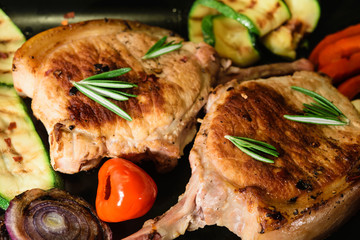 Roast Pork with Courgette, Paprika, Onion Ring, Chili and Rosemary.