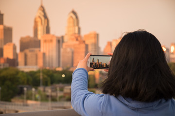 Tourist taking a photo of Philadelphia