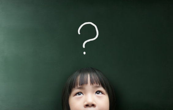 little girl thinking with  question mark over her head