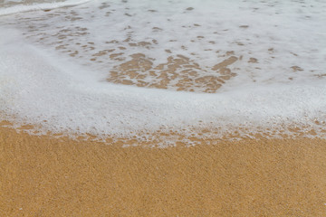 Soft wave of the sea on the beach