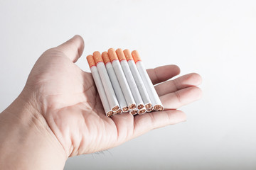 Man hand hold cigarette. World No Tobacco Day