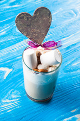 Latte coffee in cup with spices.