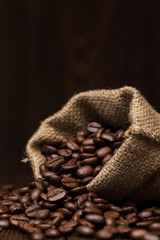 Coffee beans close up in a title bag