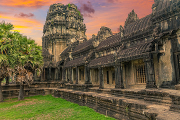 Fototapeta premium The ancient Khmer temple of Angkor Wat at sunset.