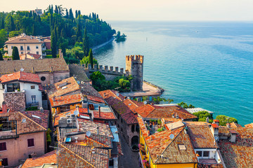 View of the Italian town of Sirmione and Lake Garda from the tower Scaliger - obrazy, fototapety, plakaty