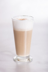 GLASS WITH COFFEE AT shallow depth of field