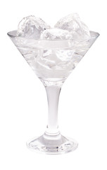 Delicious cocktail with ice cubes in martini glass on a white background.