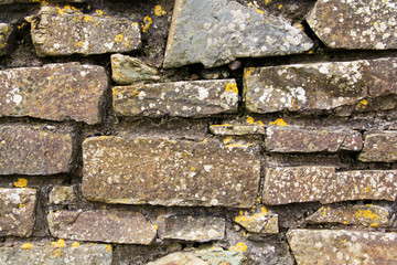 Close up of an old rustic looking stone wall